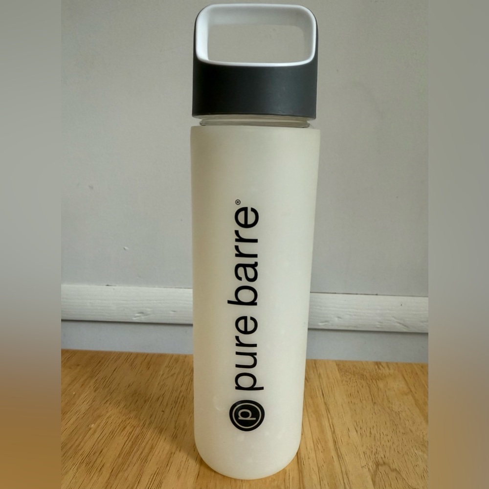 Pure Barre Glass Water Bottle with Rubber Sleeve Logo